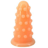 Plug anale arancione chiaro con protuberanze sferiche e base piatta