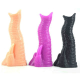 Set di 3 dildo anali a forma di proboscide elefante in silicone, colori arancione, viola e nero