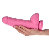 Dildo rosa silicone 25 cm tenuto in mano, testa doppio globo e venature realistiche