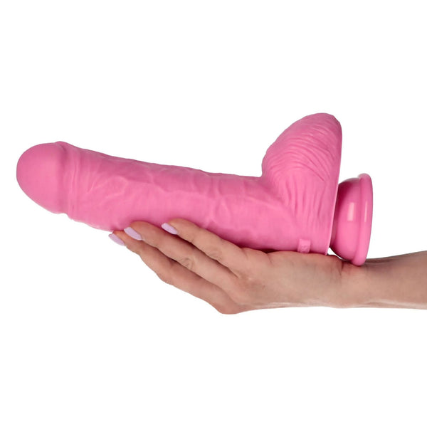 Dildo rosa silicone 25 cm tenuto in mano, testa doppio globo e venature realistiche