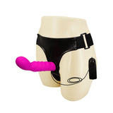 Strapon vibrante rosa in silicone con telecomando e supporto in similpelle nero