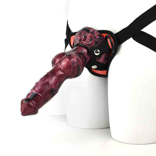 Attacco per dildo nero con inserti arancioni e design ergonomico