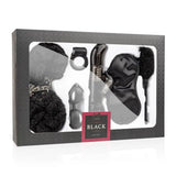 Scatola regalo nera con finestra per 6 accessori BDSM: manette, vibratore e frusta piume