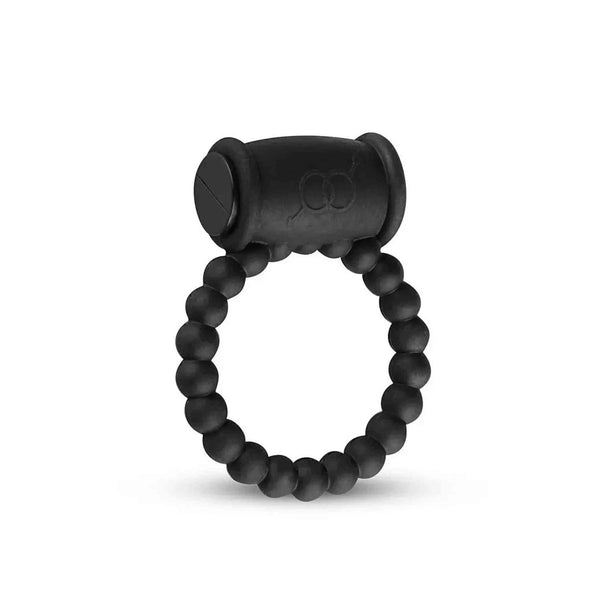 Anello vibrante nero con perline sferiche e simbolo stilizzato inciso