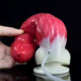 Bloodthirsty Wolf Cater in silicone rosso tenuto in mano con testa sferica e base bianca