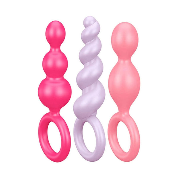 Set di tre plug anali colorati Satisfyer Booty Call, finitura lucida in silicone con forme sferiche sovrapposte e a spirale