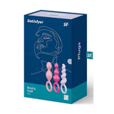 Confezione scatola Satisfyer Booty Call Plugs colorata con etichetta body safe, mostra tre plug pastello da 15 cm