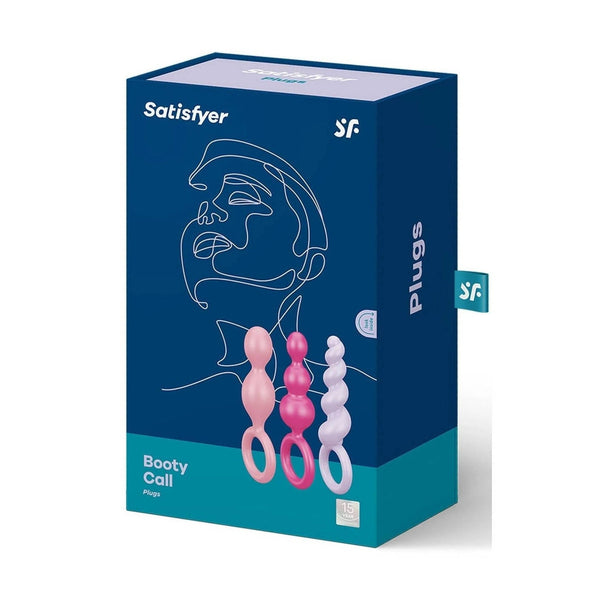 Confezione scatola Satisfyer Booty Call Plugs colorata con etichetta body safe, mostra tre plug pastello da 15 cm