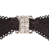 Fibbia metallica argento con sei strass su cinghia reggicalze nera