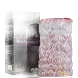 Dildo Camellia in silicone liquido accanto alla confezione Extreme Experience viola