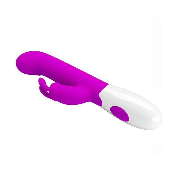 Vibratore rabbit viola acceso con braccio clitorideo esterno