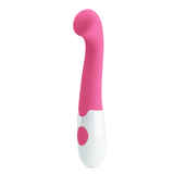 Vibratore rosa a forma di bacchetta con pulsante circolare sulla base