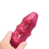 Dildo Magmara rosso scuro marbled tenuto in mano protuberanze sferiche