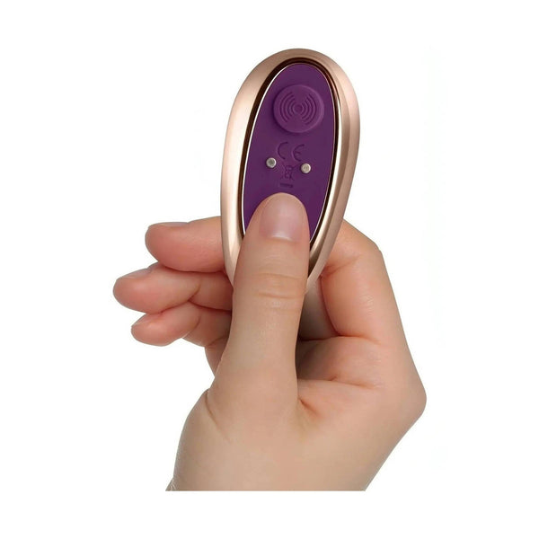 Telecomando wireless ovale per plug Desire con finitura oro rosa e pulsante onde radio