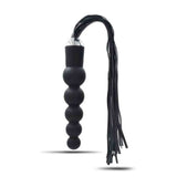 Dildo anale Globe Anal Whip nero simmetrico su sfondo bianco con dettaglio punta metallica