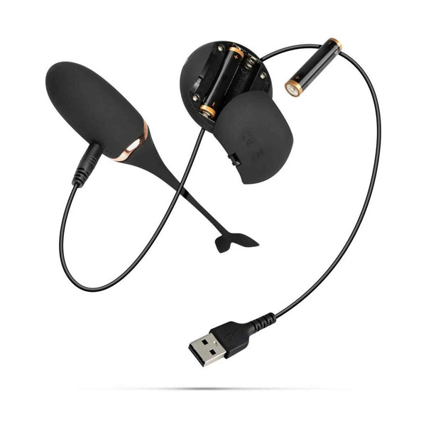 Ovetto vibrante nero Dolphin Egg aperto con batterie AA e cavo USB incluso