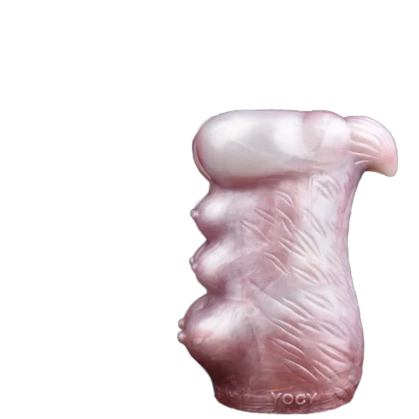 Vista laterale masturbatore silicone rosa antropomorfo con tre rilievi sferici e scritta YOCY