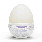 Tenga EGG Cloudy masturbatore bianco inserito nel contenitore sferico con spirali grigie