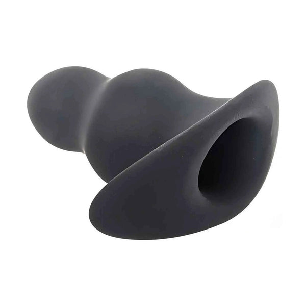Vista laterale plug anale tunnel in silicone nero opaco apertura posteriore
