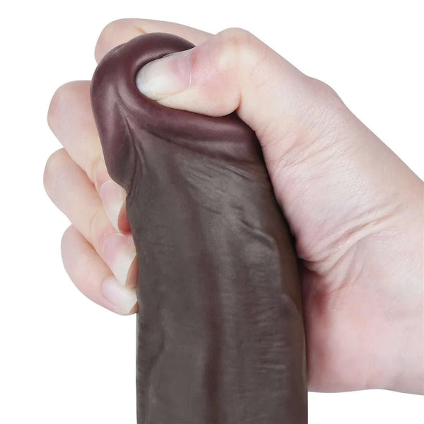Dettaglio glande retraibile dildo nero in TPE morbido e flessibile