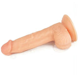 Dildo rosa carne impermeabile con gocce d'acqua su superficie opaca e ventosa