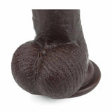 Dettaglio base larga dildo nero con scanalatura centrale e texture rugosa