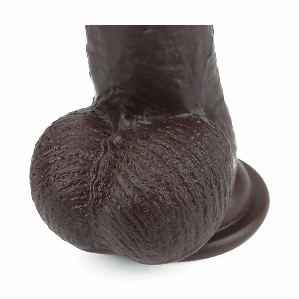 Dettaglio base larga dildo nero con scanalatura centrale e texture rugosa