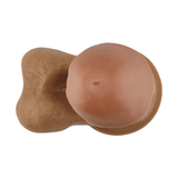 Vista dall'alto dildo anatomico marrone chiaro con punta e prepuzio