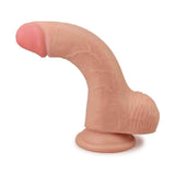 Dildo flessibile Lovetoy curvato in posizione naturale con testa rossastra