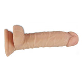 Dildo realistico rosa carne con base a ventosa e dettagli anatomici venati