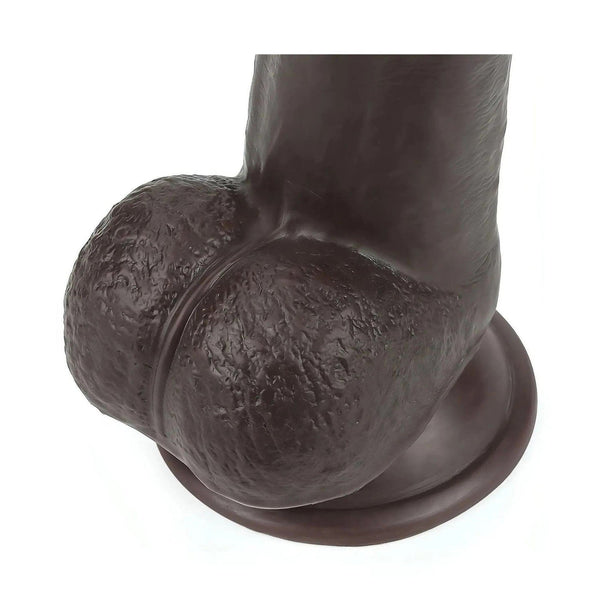 Vista ravvicinata testa scrotale rugosa e base circolare dildo nero