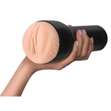 Mano che tiene masturbatore maschile Kiiroo Lacy Lennon nero con testa in silicone rosa
