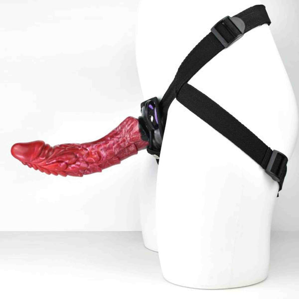 Accessorio sessuale rosso a forma di lingua con fibbie regolabili nere