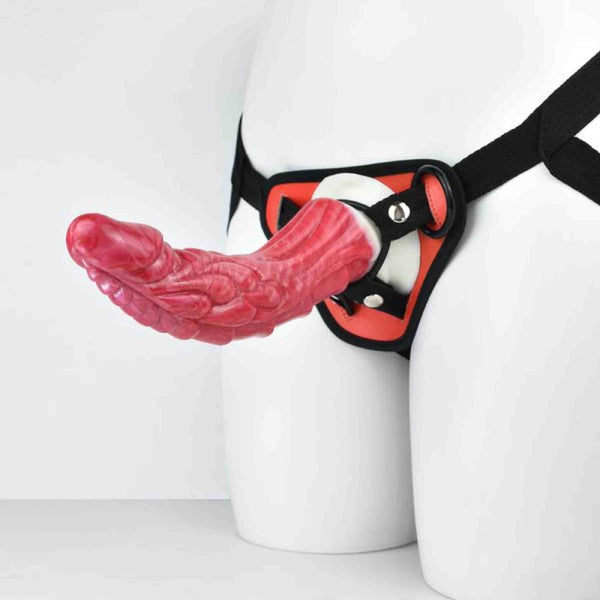 Accessorio sessuale rosso con inserto arancione e chiusura metallica