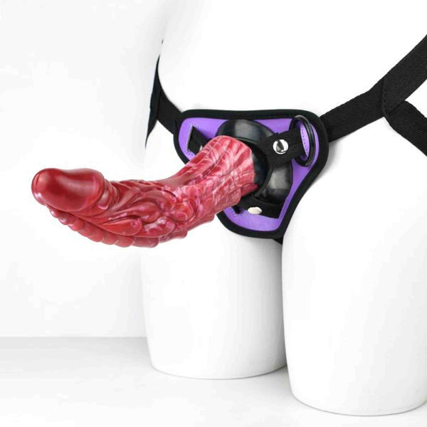 Supporto per pene viola con inserto rosso testurizzato e cinghie nere