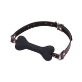 Collare pelle nera regolabile con osso in silicone nero a forma di cane