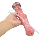 Mano tiene dildo rosa con foro di connessione tubo
