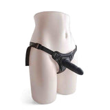 Manichino femminile che indossa strapon nero con cintura Y