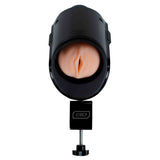 Dispositivo Keon montato su clamp da tavolo nero con interno anatomico color carne