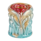 Vista dall'alto petali rossi masturbatore silicone liquido blu fiamma