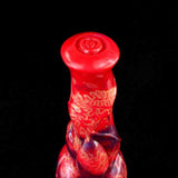 Dettaglio testa dildo Nick Magmara rosso finitura lucida motivo a spirale centrale