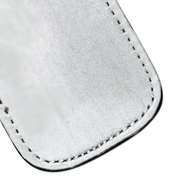 Paddle a doppia faccia argento lucido con cuciture bianche e texture granulosa