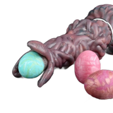 Pandora Ovipositor aperto con lobi e uova turchesi e rosa inserite