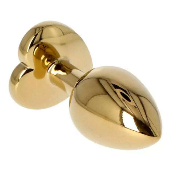 Plug anale ergonomico forma cuore metallo dorato superficie liscia vista laterale