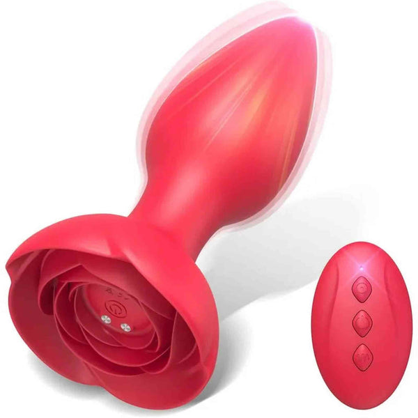 Plug anale rosa silicone base stilizzata con telecomando rotondo wireless