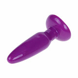 Plug anale morbido viola intenso con forma ergonomica curva su sfondo bianco