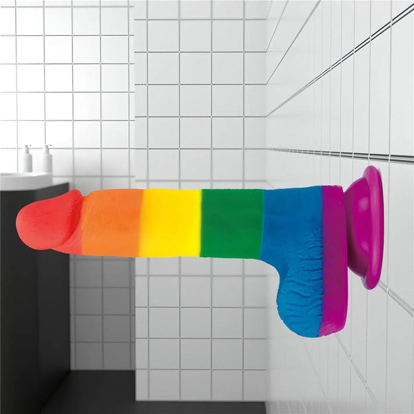 Dildo silicone arcobaleno appeso al muro con ventosa rosa in bagno