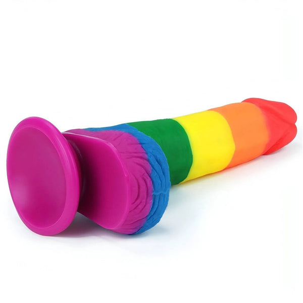 Angolo laterale dildo silicone arcobaleno con base adesiva piatta e texture pelle