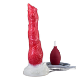 Vista frontale dildo silicone rosso texture scaglie occhio e bocca stilizzata