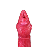 Primo piano punta dildo silicone rosso apertura centrale texture scaglie dettagliati